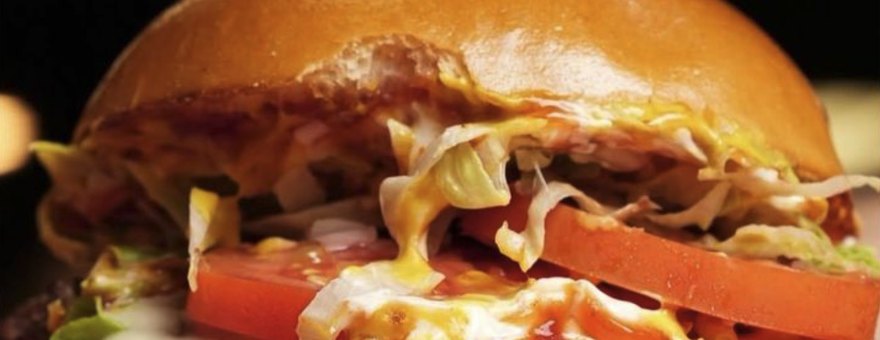 Rooster's smash burger with lettuce and tomato